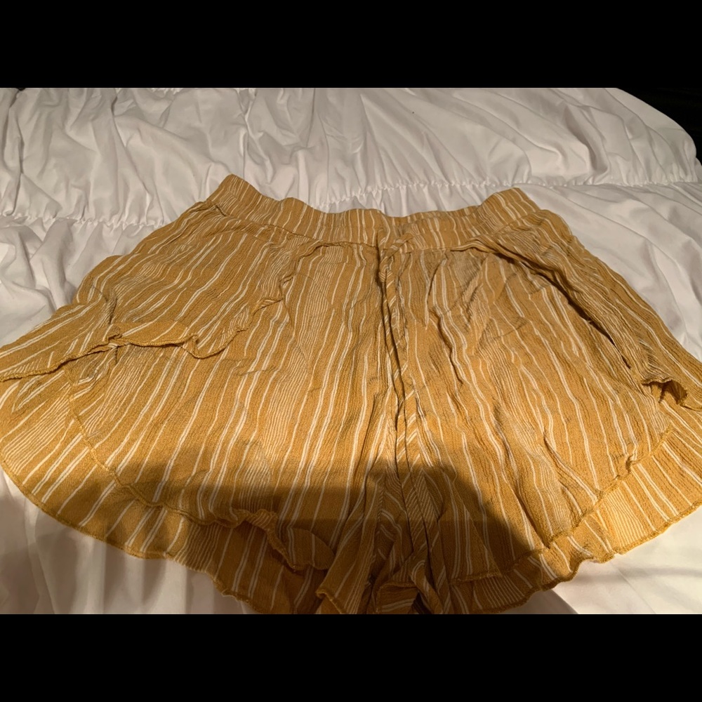 Yellow and white flowy shorts